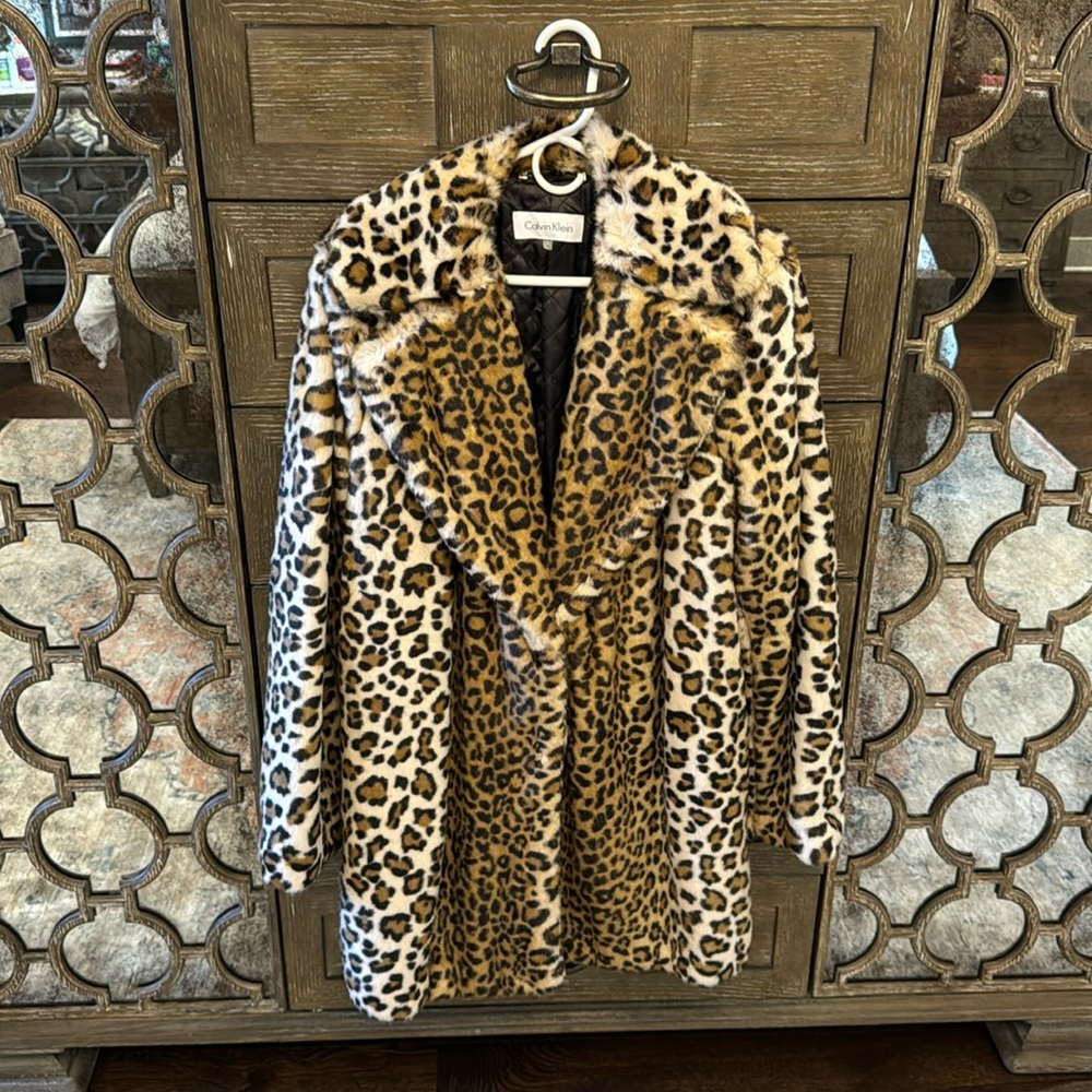 Faux fur knee length coat